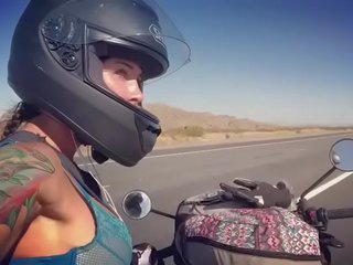 Felicity feline motorcycle feature riding aprilia in bra