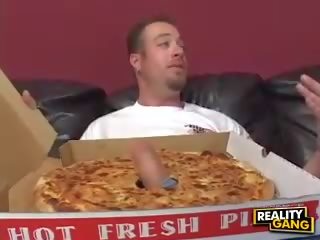 Milf with big tits gives a blowjob to a pizza delivery boy