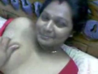 Indian beguiling Desi Aunty In Red Dress